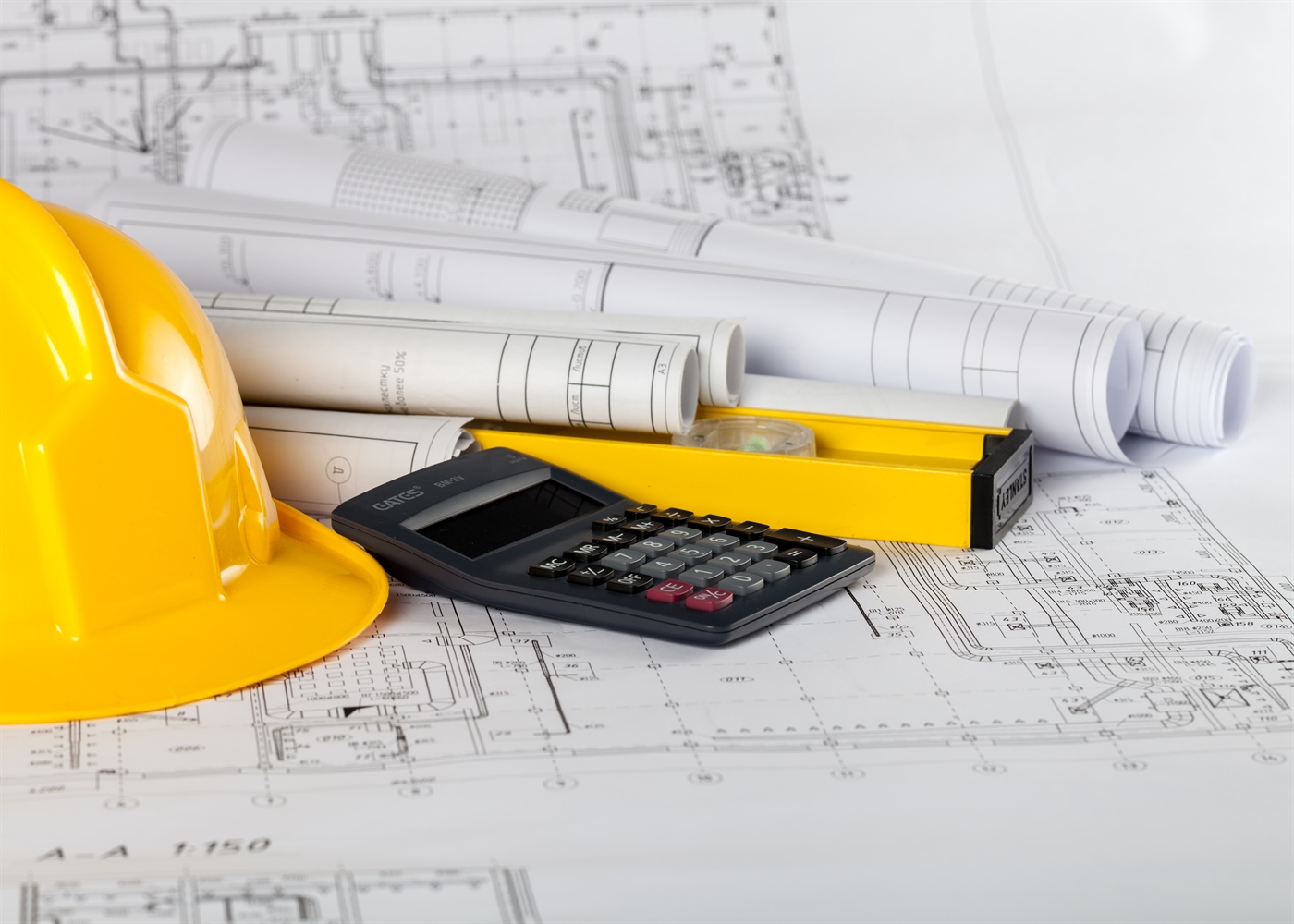 Engineers reviewing designs on site